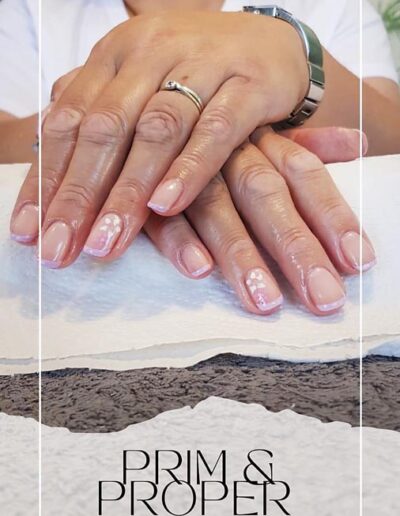 Prim and Proper Salon and Spa - Nude French Nails with floral art