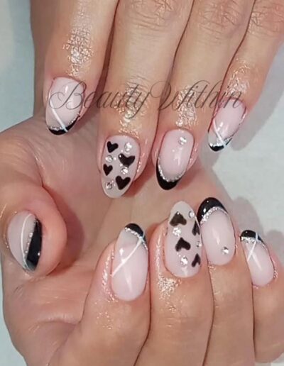BeautyWithin - Pale nails with black hearts and french tips