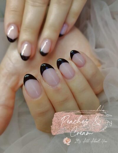 Peaches and Cream Nailroom - Black on nude French Nails