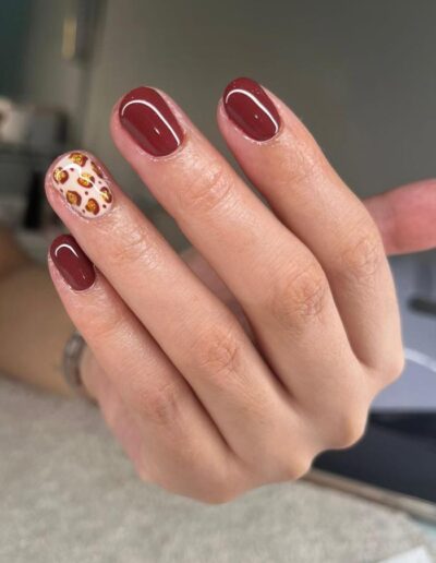 TiiQue - Red and animal print nails